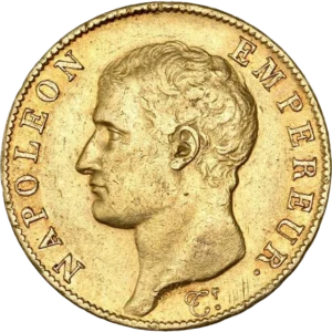 Tête laurée de Napoléon Ier à gauche.