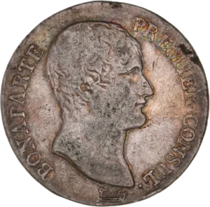 Tête nue de Napoléon Ier à droite.