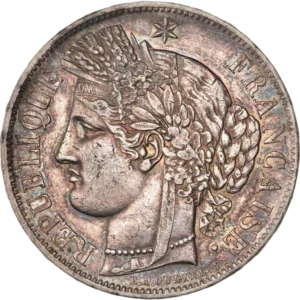 Tête de Cérès surmontée d'une couronne faite d'un ruban, de fleurs, d'épis de blé, de feuilles de laurier et de chêne. Un collier de perle entoure son cou.