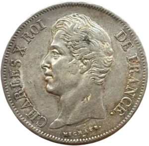 Tête nue de Charles X à gauche.