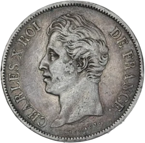 Tête nue de Charles X à gauche.