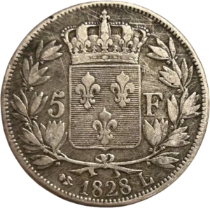 Tête nue de Charles X à gauche.