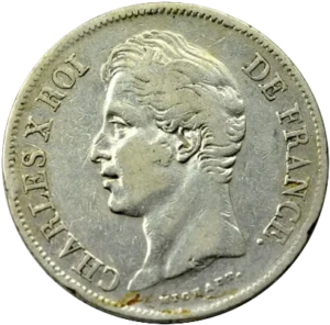 Tête nue de Charles X à gauche.