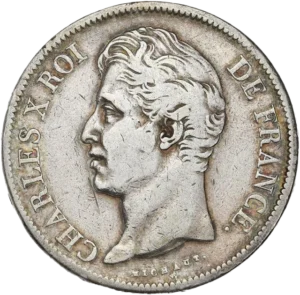 Tête nue de Charles X à gauche.