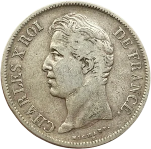 Tête nue de Charles X à gauche.