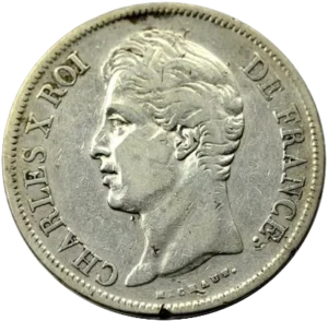 Tête nue de Charles X à gauche.