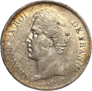 Tête nue de Charles X à gauche.