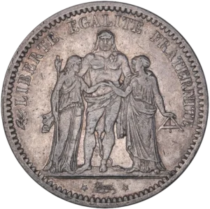 Hercule barbu demi-nu, debout de face avec la léonté, entouré de la Liberté debout à gauche tenant une pique surmontée d'une main de Justice et de l'Égalité debout à droite, tenant un niveau.