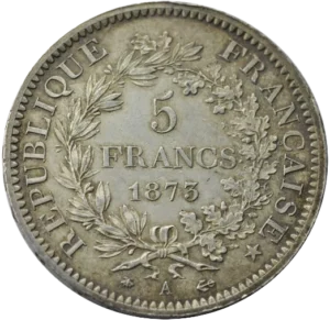 L'inscription "5 francs 1873" entouré d'une couronne de laurier et de chêne.