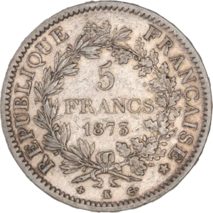 L'inscription "5 francs 1873" entouré d'une couronne de laurier et de chêne.