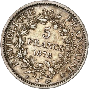 L'inscription "5 francs 1878" entouré d'une couronne de laurier et de chêne.