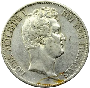 Tête nue de Louis Philippe Ier à droite.