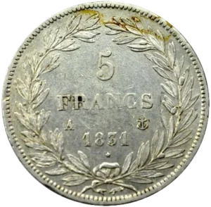 L'inscription "5 francs" entourée d'une couronne de laurier.