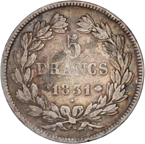 L'inscription "5 francs 1831" entouré d'une couronne de laurier et de chêne.