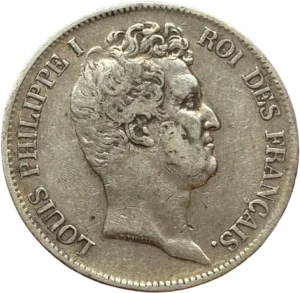 Tête nue de Louis Philippe Ier à droite.