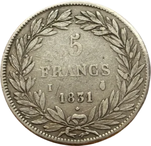 L'inscription "5 francs 1831" entouré d'une couronne de laurier et de chêne.