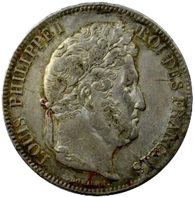 Tête laurée de Louis Philippe Ier à droite.