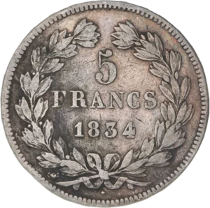 L'inscription "5 francs" entourée d'une couronne de laurier.