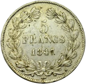 L'inscription "5 francs" entourée d'une couronne de laurier.