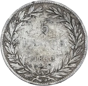 L'inscription "5 francs 1831D" entouré d'une couronne de laurier et de chêne.