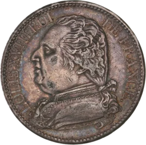 Buste habillé de Louis XVIII à gauche.