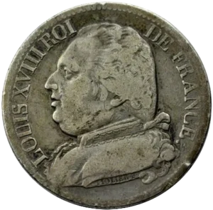 Buste Habillé de Louis XVIII à gauche.