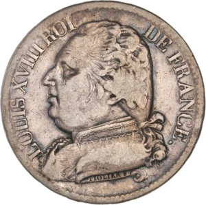 Buste habillé de Louis XVIII à gauche.