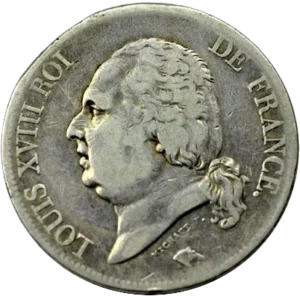 Buste nu de Louis XVIII à gauche.