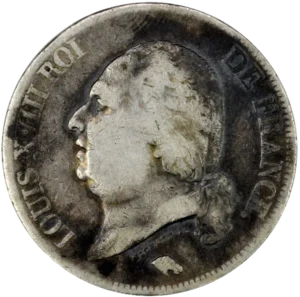 Tête de Louis XVIII à gauche.