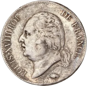 Tête nue de Louis XVIII à gauche.