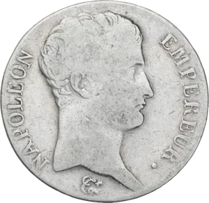 Tête nue de Napoléon Ier à droite.