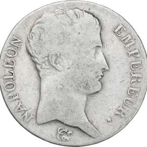 Tête nue de Napoléon Ier à droite.