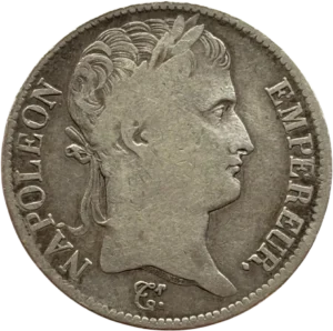 Tête laurée de Napoléon Ier à droite.