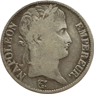 Tête laurée de Napoléon Ier à droite.