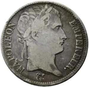 Tête laurée de Napoléon Ier à droite.
