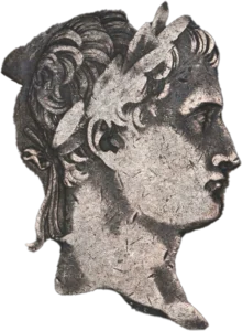 Tête laurée de Napoléon Ier à droite.