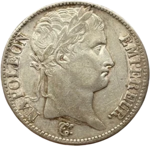 Tête laurée de Napoléon Ier à droite.