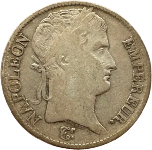Tête laurée de Napoléon Ier à droite.