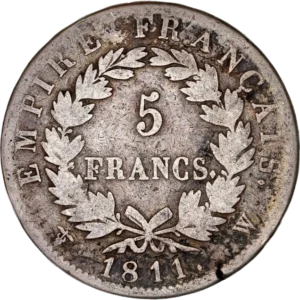 Tête laurée de Napoléon Ier à droite.