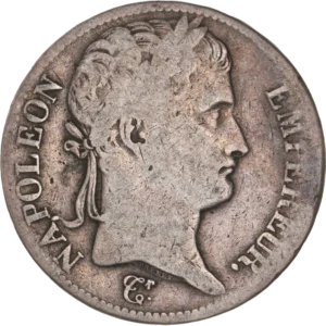 Tête laurée de Napoléon Ier à droite.