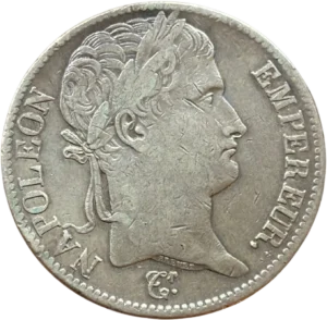 Tête laurée de Napoléon Ier à droite.