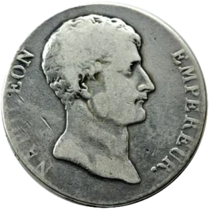 Tête nue de Napoléon Ier à droite.