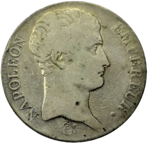 Tête nue de Napoléon Ier à droite.