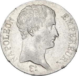 Tête nue de Napoléon Ier à droite.