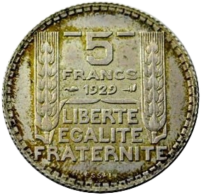 Tête de la République à droite, coiffée d'un bonnet phrygien lauré.