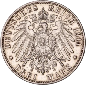 Aigle couronné aux ailes déployées et décoré d'un blason.