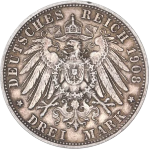 Aigle couronné aux ailes déployées et décoré d'un blason.