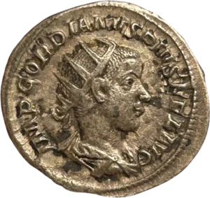 Buste radié et cuirassé de Gordien III à droite.