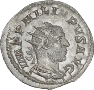 Buste radié, drapé et cuirassé de Philippe Ier à droite.