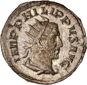 Buste radié et drapé de Philippe Ier à droite.